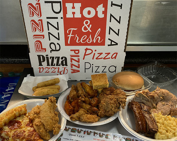 quick 7 pizza anf fried chicken with menus display
