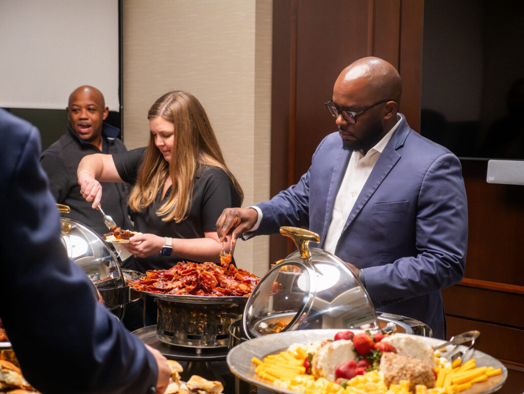 Banking and Bourbon – Metro Jackson guest getting food